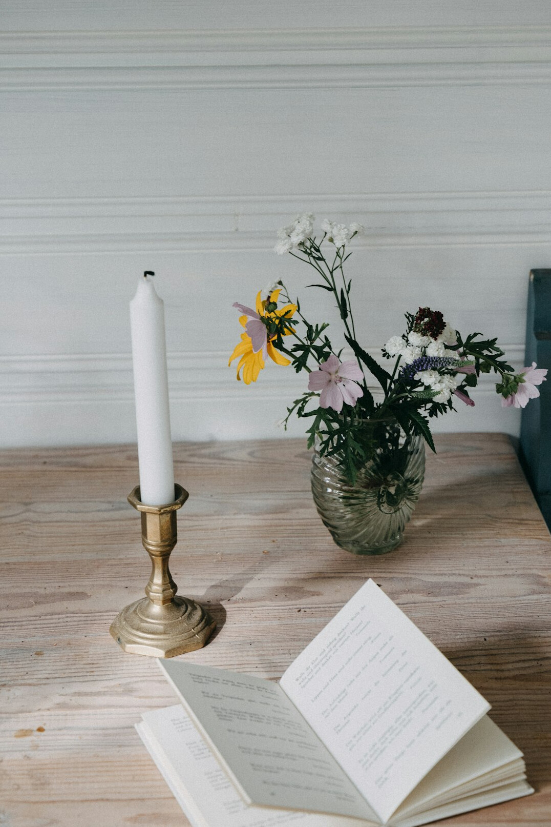 reading book by candlelight
